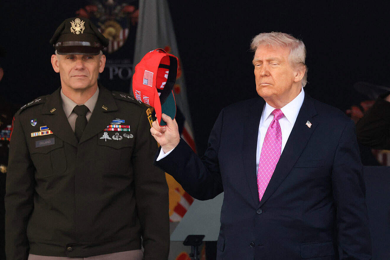 U.S. President Donald Trump removes his hat as he departs after delivering the commencement address at the 2025 U.S. Military Academy Graduation Ceremony at West Point, N.Y., on May 24, 2025. Photo by Charly Triballeau/AFP via Getty Images.