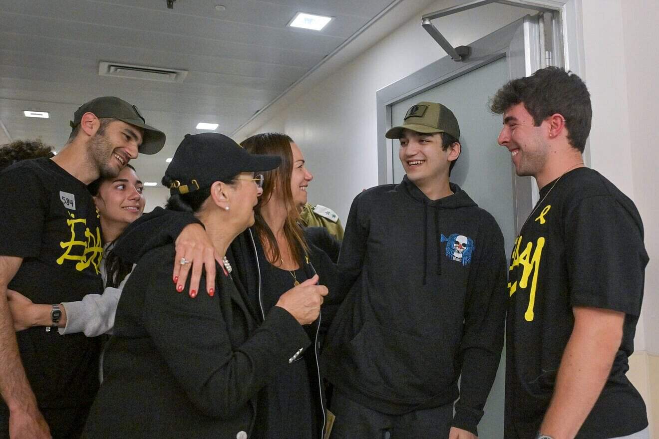 IDF Staff Sgt. Edan Alexander embraces family members during an emotional reunion at Tel Aviv Sourasky Medical Center on May 12, 2025. Photo by Kobi Gideon/GPO.