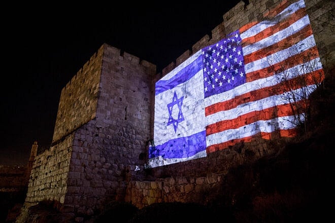 The Israeli and the American flags are screened on the walls of Jerusalem's Old City ahead of the speech by U.S. President Donald Trump on Dec. 6, 2017. Photo by Yonatan Sindel/Flash90.