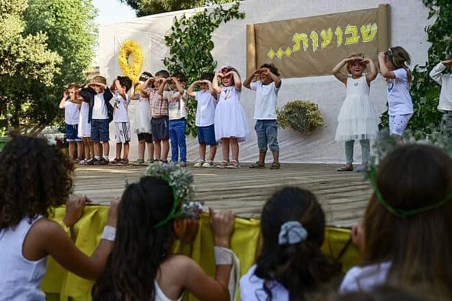 Children perform as part of a Shavuot celebration in Kibbutz Ein Ziwan, Golan Heights, on June 11, 2024. Photo by Michael Giladi/Flash90.