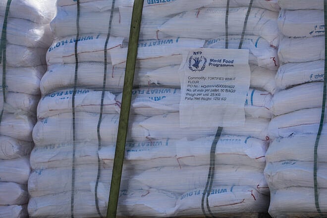 Trucks loaded with humanitarian aid on the Israel side of the border before entering the Gaza Strip on May 19, 2025. Photo by Flash90.