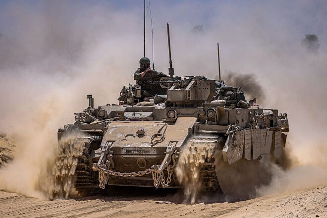 Armored personnel carrier seen on the Israeli border with the Gaza Strip, southern Israel, May 20, 2025. Photo by Jamal Awad/Flash90.