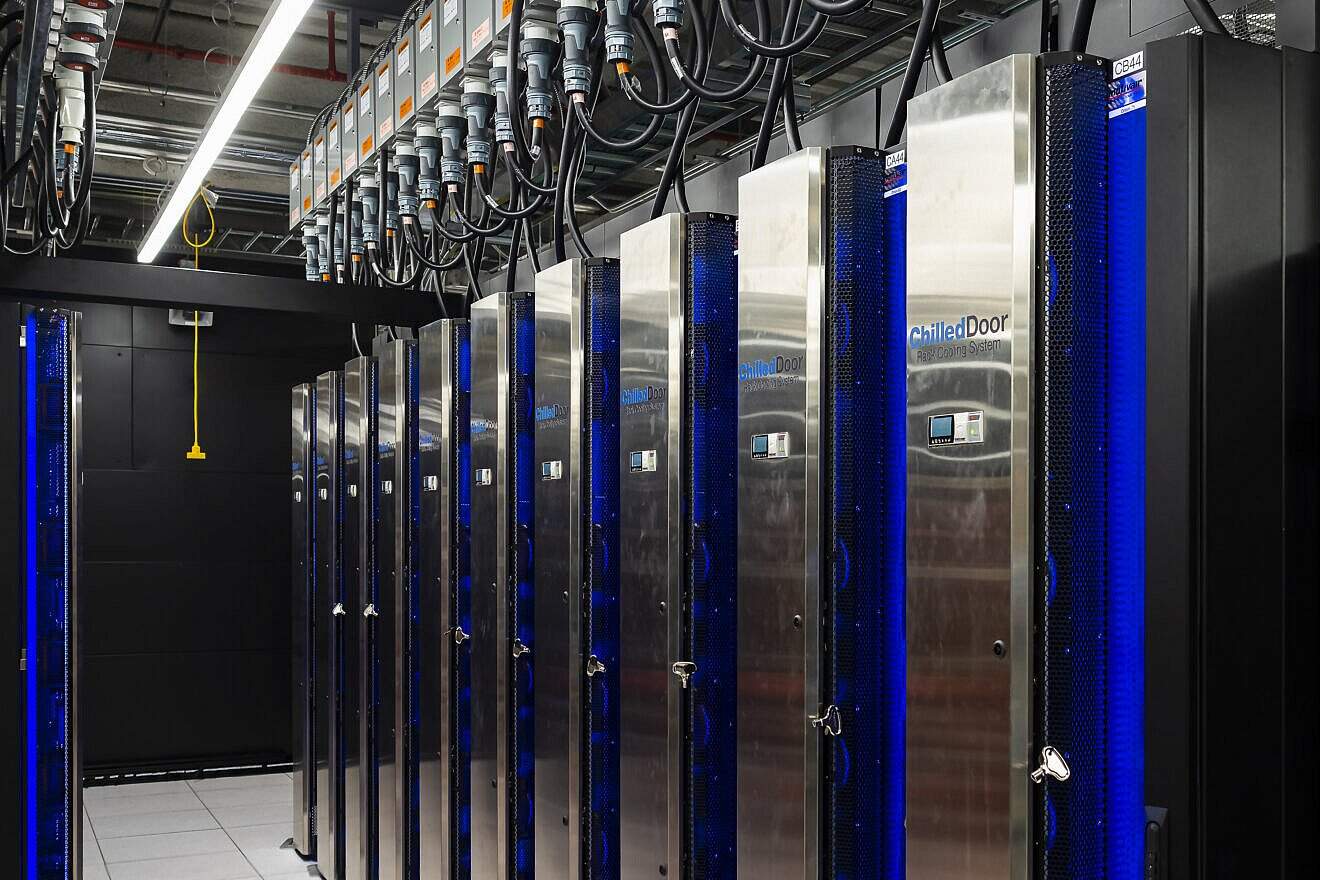 The Frontier supercomputer at the U.S. Department of Energy’s Oak Ridge National Laboratory on July 5, 2022. Credit: Oak Ridge National Laboratory via Wikimedia Commons.