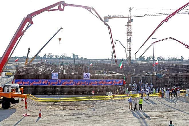 A picture taken on November 10, 2019, shows workers on the construction site of a second reactor in Iran's Bushehr nuclear power plant, during an official ceremony to kick-start the works at the facility. Photo by Atta Kenare/AFP via Getty Images.