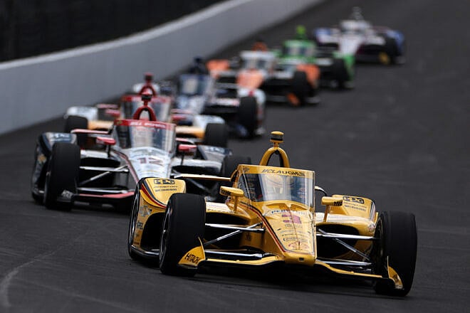 Scott McLaughlin, driver of the #3 Pennzoil Team Penske, leads during the 108th Running of the Indianapolis 500 at Indianapolis Motor Speedway on May 26, 2024 in Indianapolis, Indiana. Photo by James Gilbert/Getty Images.
