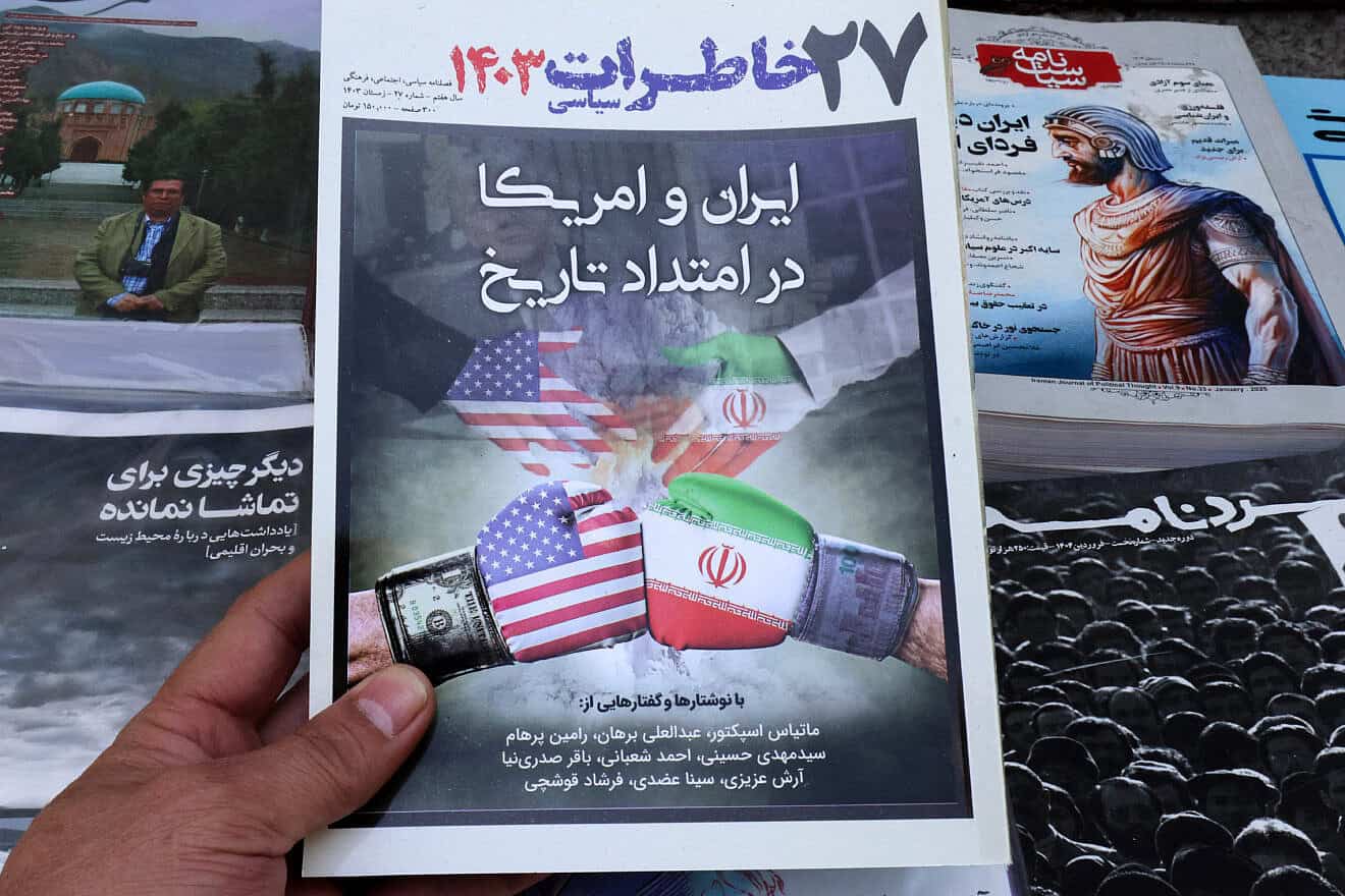 The front page of a newspaper at a kiosk in Tehran featuring talks between the United States and Iran on nuclear weapons on April 19, 2025. Photo by Atta Kenare/AFP via Getty Images.