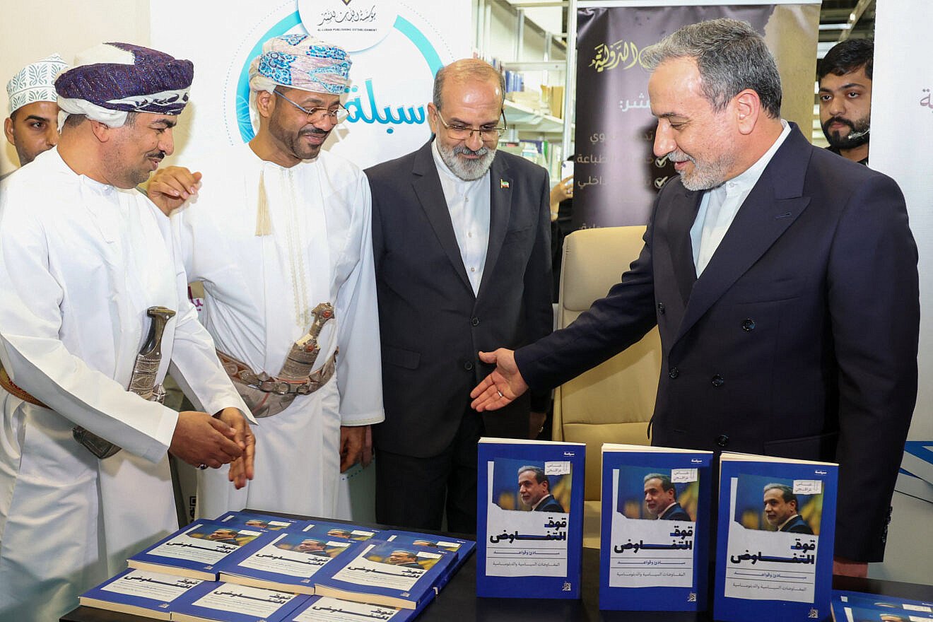Iran's Foreign Minister Abbas Araghchi (right) sits for the signing ceremony of his book "The Power of Negotiation," in the presence of Oman's Foreign Minister Sayyid Badr al-Busaidi (second from left), at the Muscat International Book Fair on April 25, 2025. Photo by Haitham al-Shukairi/AFP via Getty Images. Iran's Foreign Minister Abbas Araghchi (right) sits for the signing ceremony of his book "The Power of Negotiation," in the presence of Oman's Foreign Minister Sayyid Badr al-Busaidi (second from left), at the Muscat International Book Fair on April 25, 2025. Photo by Haitham al-Shukairi/AFP via Getty Images.