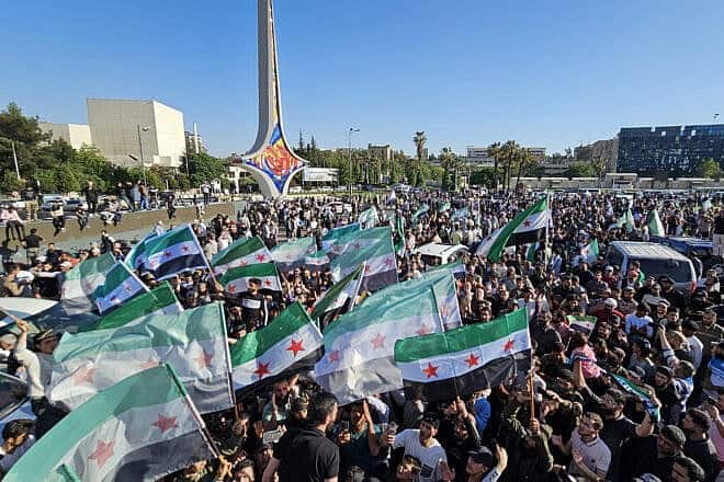Supporters of Issam Buwaydani, the head of Jaysh al-Islam ("Army of Islam"), a Sunni Islamist coalition that fought against former president Bashar Assad, during a protest calling for his release in Damascus, April 28, 2025. Photo by Bakr Alkasem/AFP via Getty Images.