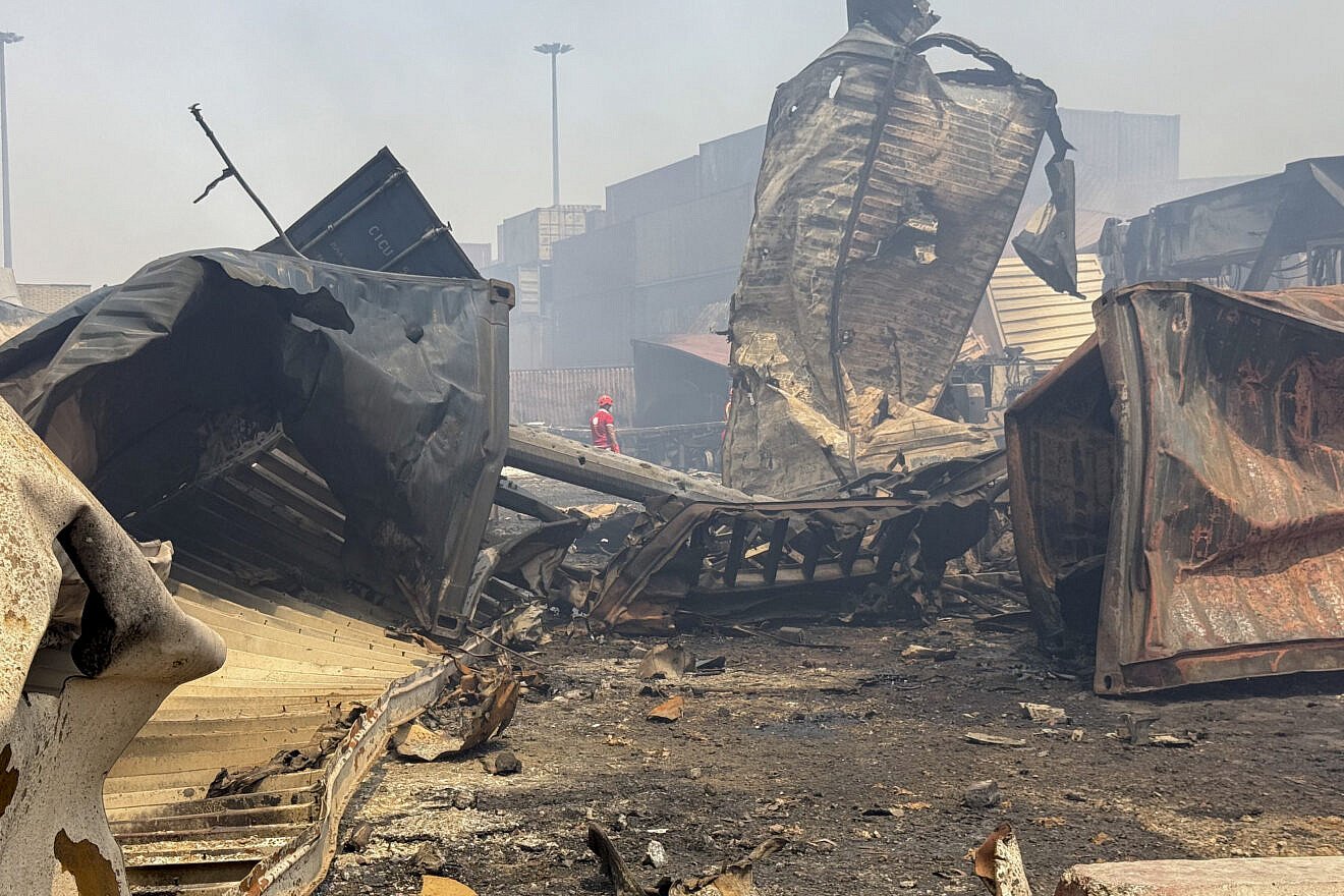 Firefighters search through the rubble days after a massive explosion resulted in a fire at the Shahid Rajaee Port in Bandar Abbas, Iran, on April 29, 2025. Photo by RAHIM/Middle East Images/AFP via Getty Images.