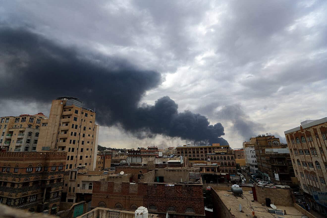 Smoke rises following an Israeli strike on Yemen's Houthi-held capital of Sanaa, May 6, 2025. Photo by Mohammed Huwais/AFP via Getty Images.