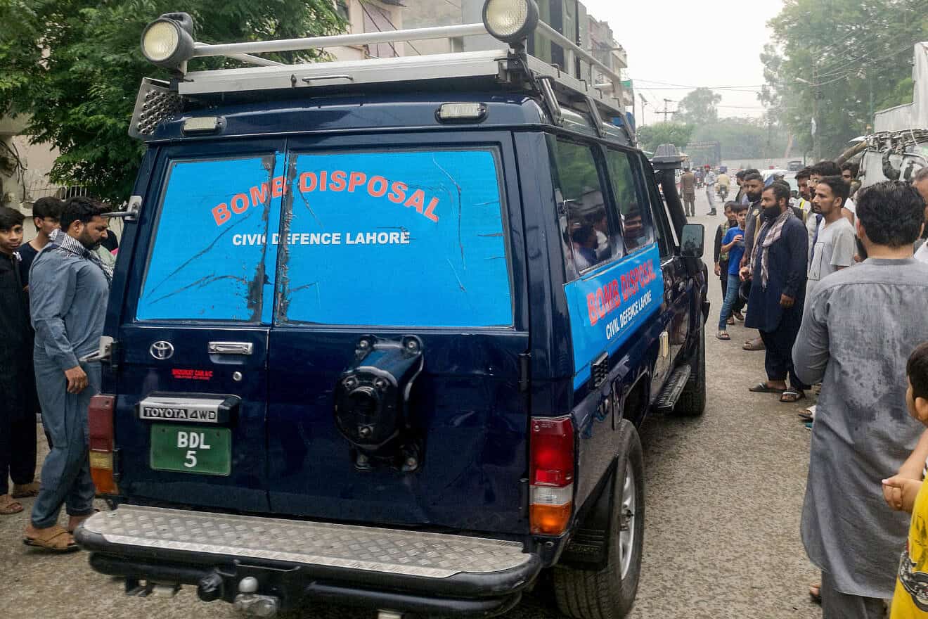 A bomb disposal squad vehicle enroute to a site after an alleged drone was shot down in Lahore, Pakistan, May 8, 2025. Photo by Murtaza Ali/AFP via Getty Images.