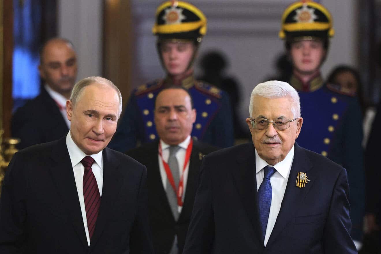 Russian President Vladimir Putin and Palestinian Authority chief Mahmoud Abbas enter the hall during their meeting at the Grand Kremlin Palace in Moscow on May 10, 2025. Photo by Contributor/Getty Images.