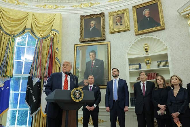 U.S. President Donald Trump delivers remarks alongside U.S. Vice President JD Vance, Special Envoy to the Middle East Steve Witkoff and Witkoff's family during the swearing-in ceremony in the Oval Office at the White House in Washington, D.C., on May 6, 2025. Photo by Anna Moneymaker/Getty Images.