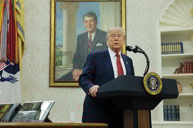 U.S. President Donald Trump speaks during a swearing-in ceremony for new U.S. Ambassador to China David Perdue in the Oval Office at the White House in Washington, D.C., May 7, 2025. Photo by Anna Moneymaker/Getty Images.