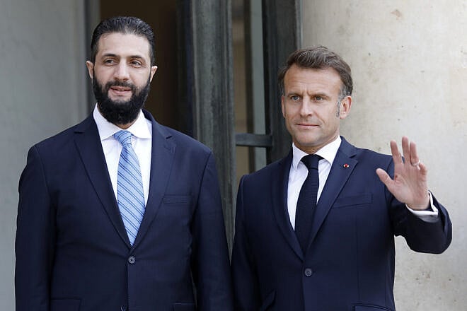 French President Emmanuel Macron welcomes Syria's interim president Ahmed al-Sharaa at Elysee Palace in Paris, France, May 7, 2025. Photo by Antoine Gyori-Corbis/Getty Images.