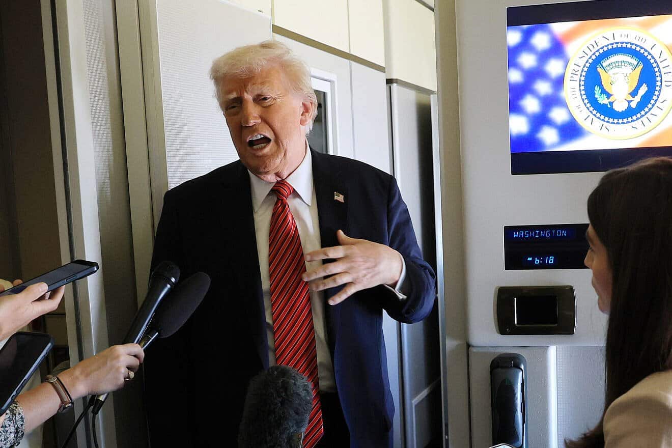 U.S. President Donald Trump speaks to media aboard Air Force One on a range of issues, including Syria, as he flies to Doha, Qatar, on May 14, 2025. Photo by Win McNamee/Getty Images.