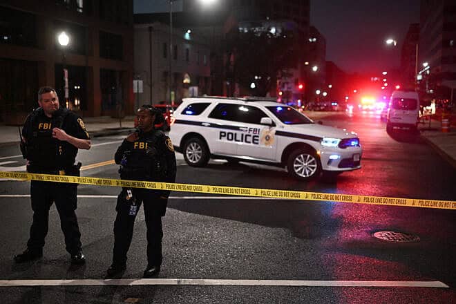FBI agents cordon off the scene outside the Capital Jewish Museum following a shooting that left two people dead, in Washington, DC, in the early hours of May 22, 2025. Two Israeli embassy staff members were killed near a Jewish museum in Washington late Wednesday May 21, US Homeland Security chief Kristi Noem said.
"Two Israeli Embassy staff were senselessly killed tonight near the Jewish Museum in Washington DC. We are actively investigating and working to get more information to share," she posted on X. (Photo by Alex WROBLEWSKI / AFP) (Photo by ALEX WROBLEWSKI/AFP via Getty Images)