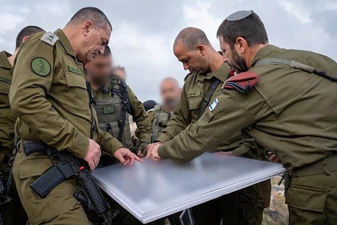 IDF Chief of Staff Lt. Gen. Eyal Zamir (left) conducts an assessment at the scene of a deadly terror attack in Samaria, May 15, 2025. Credit: IDF.