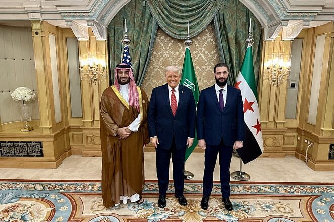 U.S. President Donald Trump meets with Syrian President Ahmed al-Sharaa and Saudi Crown Prince Mohammed bin Salman in Riyadh, Saudi Arabia, May 14, 2025. Credit: White House.