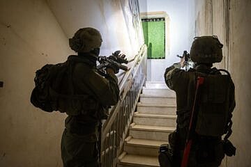 IDF troops detain suspects in Judea and Samaria amid a crackdown on online incitement linked to the wildfires raging near Jerusalem, May 2025. Credit: IDF.