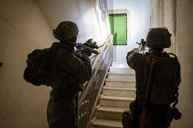 IDF troops detain suspects in Judea and Samaria amid a crackdown on online incitement linked to the massive wildfires raging near Jerusalem, May 2025. Credit: IDF.