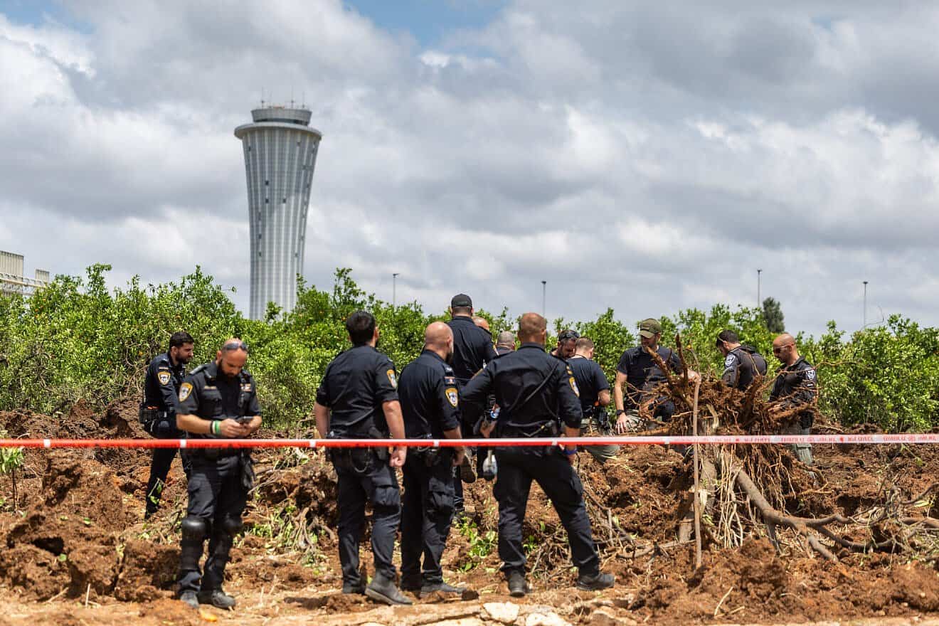 Israeli security forces at the site where a missile fired from the Houthis in Yemen hit an area of Ben-Gurion International Airport, May 4, 2025. Photo by Chaim Goldberg/Flash90.