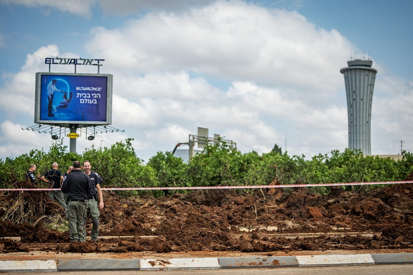 Israeli security forces at the site where a missile fired from the Houthis in Yemen hit an area of Ben-Gurion International Airport, May 4, 2025. Photo by Chaim Goldberg/Flash90.