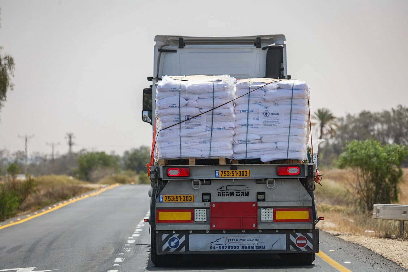 Trucks loaded with humanitarian aid on the Israeli side of the border before entering the Gaza Strip, May 19, 2025. Photo by Flash90.