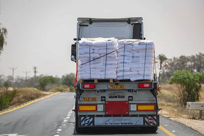 Trucks loaded with humanitarian aid on the Israeli side of the border before entering the Gaza Strip, May 19, 2025. Photo by Flash90.