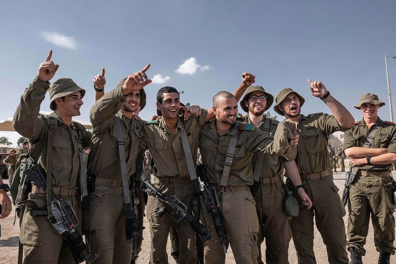 Israeli soldiers dance and enjoy a live concert of Israeli singer Idan Raichel at an army base in southern Israel, Oct. 31, 2023. Photo by Chen Schimmel/Flash90.
