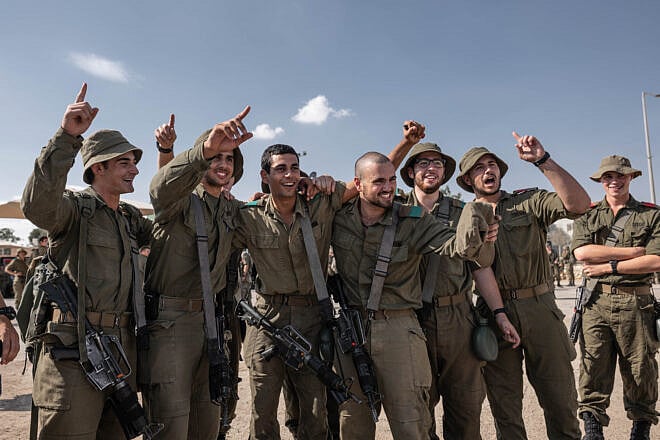 Israeli soldiers dance and enjoy a live concert of Israeli singer Idan Raichel at an army base in southern Israel, Oct. 31, 2023. Photo by Chen Schimmel/Flash90.