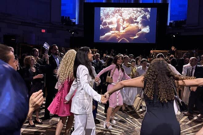 Guests dance to Israeli folk music during the Consulate General of Israel’s Independence Day celebration in Midtown Manhattan on May 11, 2025. Photo by Vita Fellig.