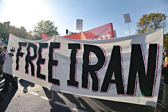 A "Free Iran" banner at a solidarity rally in Germany on Oct. 22, 2022. Credit: Leonhard Lenz via Wikimedia Commons.