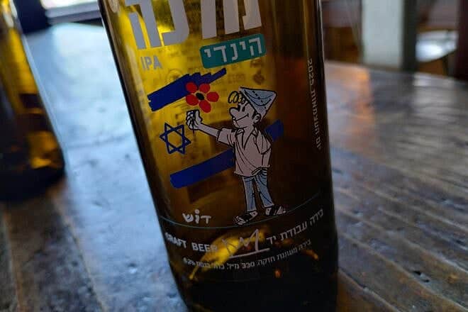 Special-edition 2025 label featuring the cartoon character “Srulik” for Yom Ha'atzmaut, Israel's Independence Day, at Malka Brewery. Photo by Carin M. Smilk.
