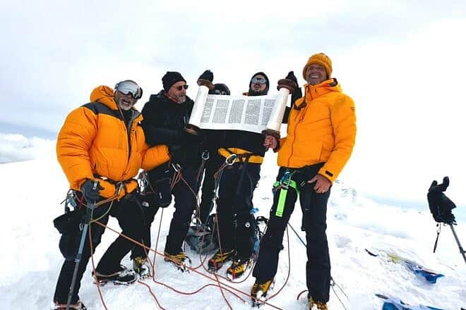 Minyan Everest climbers with their Torah scroll atop Mera Peak in northeastern Nepal, May 6, 2025. Credit: Minyan Everest.