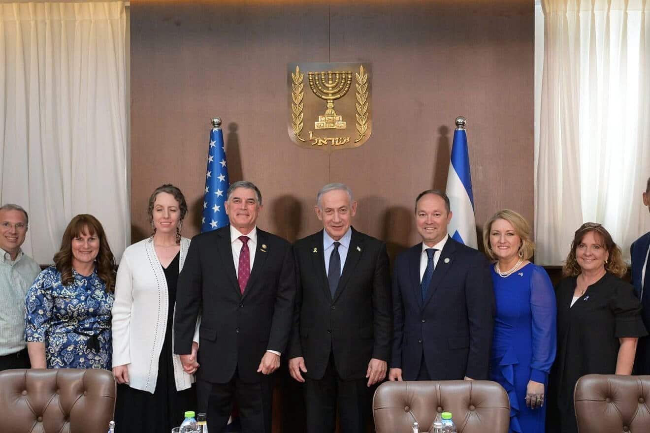 Israeli Prime Minister Benjamin Netanyahu is flanked by Reps. Andrew Clyde (fourth from left) and Marlin Stutzman (third from right) in Jerusalem on May 27, 2025. Photo by Amos Ben-Gershom/GPO.
