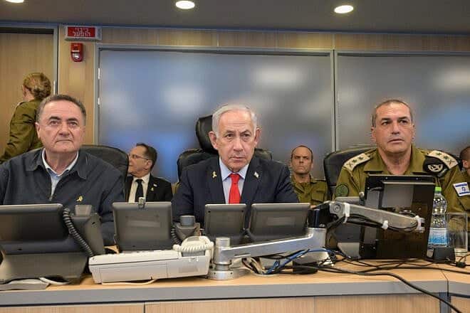 From left to right: Defense Minister Israel Katz, Prime Minister Benjamin Netanyahu, and IDF Chief of Staff Lt. Gen. Eyal Zamir at the Air Force Command Center in the Kirya during Israel’s strike on Houthi targets in Yemen, May 5, 2025.
Photo Credit: Ma'ayan Toaf/GPO.