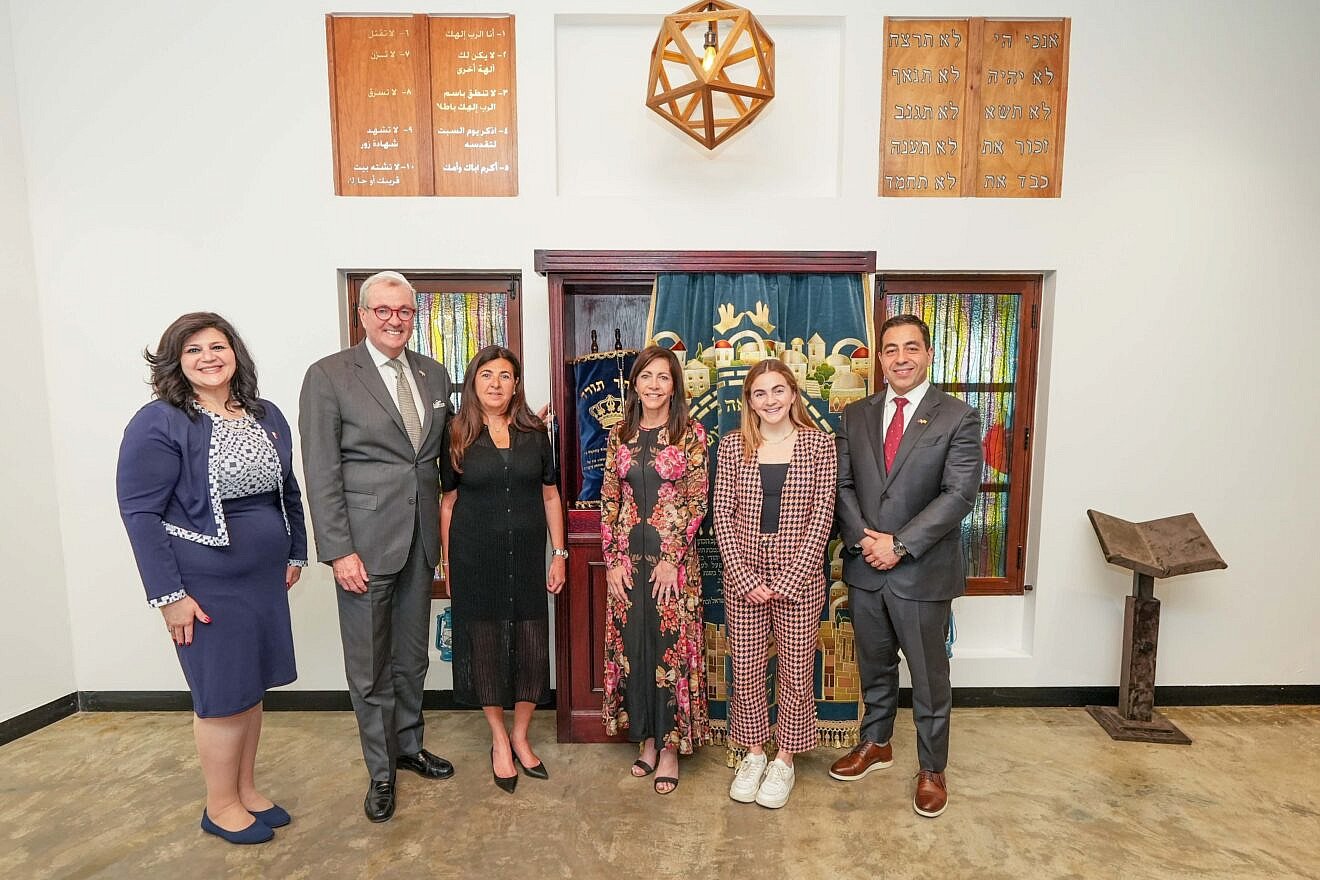 New Jersey Gov. Phil Murphy (second from left) stands alongside his wife Tammy Murphy (fourth from left) and former Bahrain envoy to the United States Houda Nonoo (third from left) at the House of Ten Commandments in Manama, Bahrain, in April 2025. Credit: Courtesy of New Jersey governor's office.