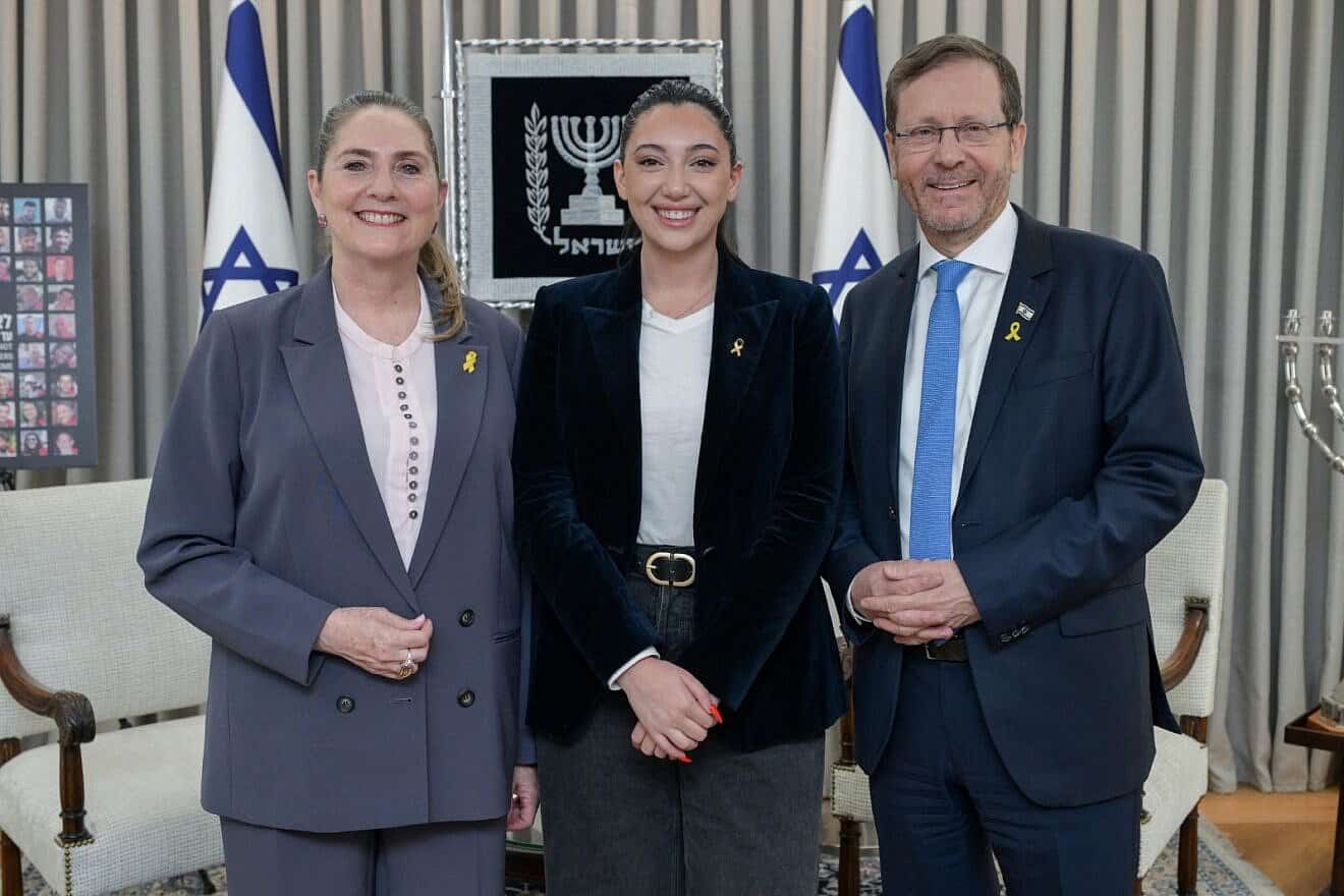 Yuval Raphael, Israel's representative in the 2025 Eurovision Song Contest, is flanked by President Isaac Herzog and first lady Michal Herzog at the President's Residence in Jerusalem, May 5, 2025. Photo by Ma'ayan Toaf/GPO.
