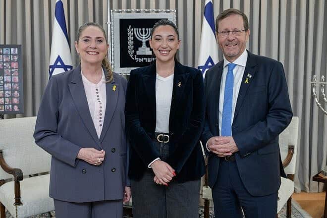 Yuval Raphael, Israel's representative in the 2025 Eurovision Song Contest, is flanked by President Isaac Herzog and first lady Michal Herzog at the President's Residence in Jerusalem, May 5, 2025. Photo by Ma'ayan Toaf/GPO.