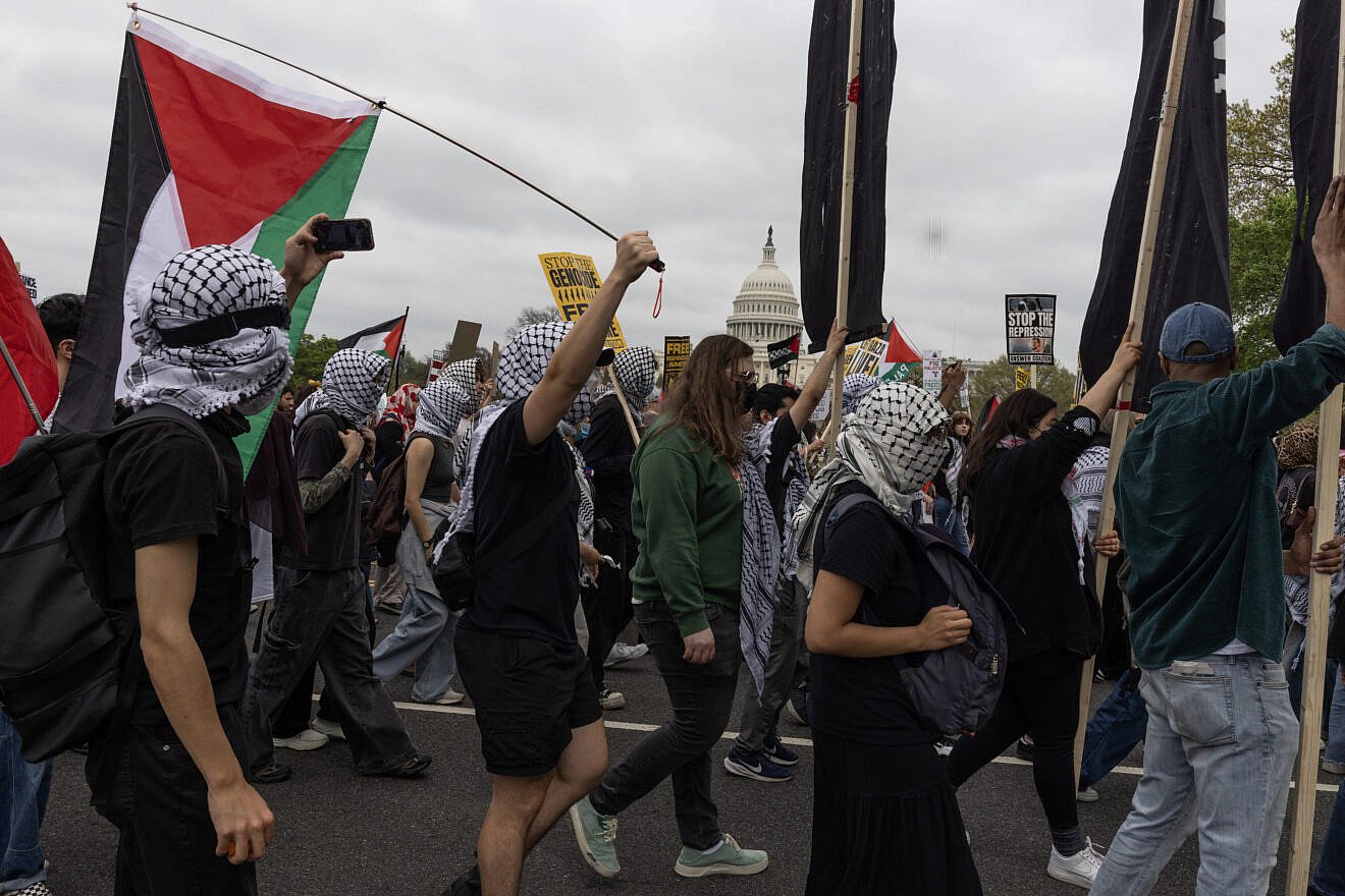 Anti-Israel demonstrators hold a rally and march to the national headquarters of the U.S. Immigration and Customs Enforcement agency to protest the arrest of Palestinian activists, as well as Israel's military operations in the Gaza Strip, April 5, 2025 in Washington, D.C. Photo by Andrew Lichtenstein/Corbis via Getty Images.
