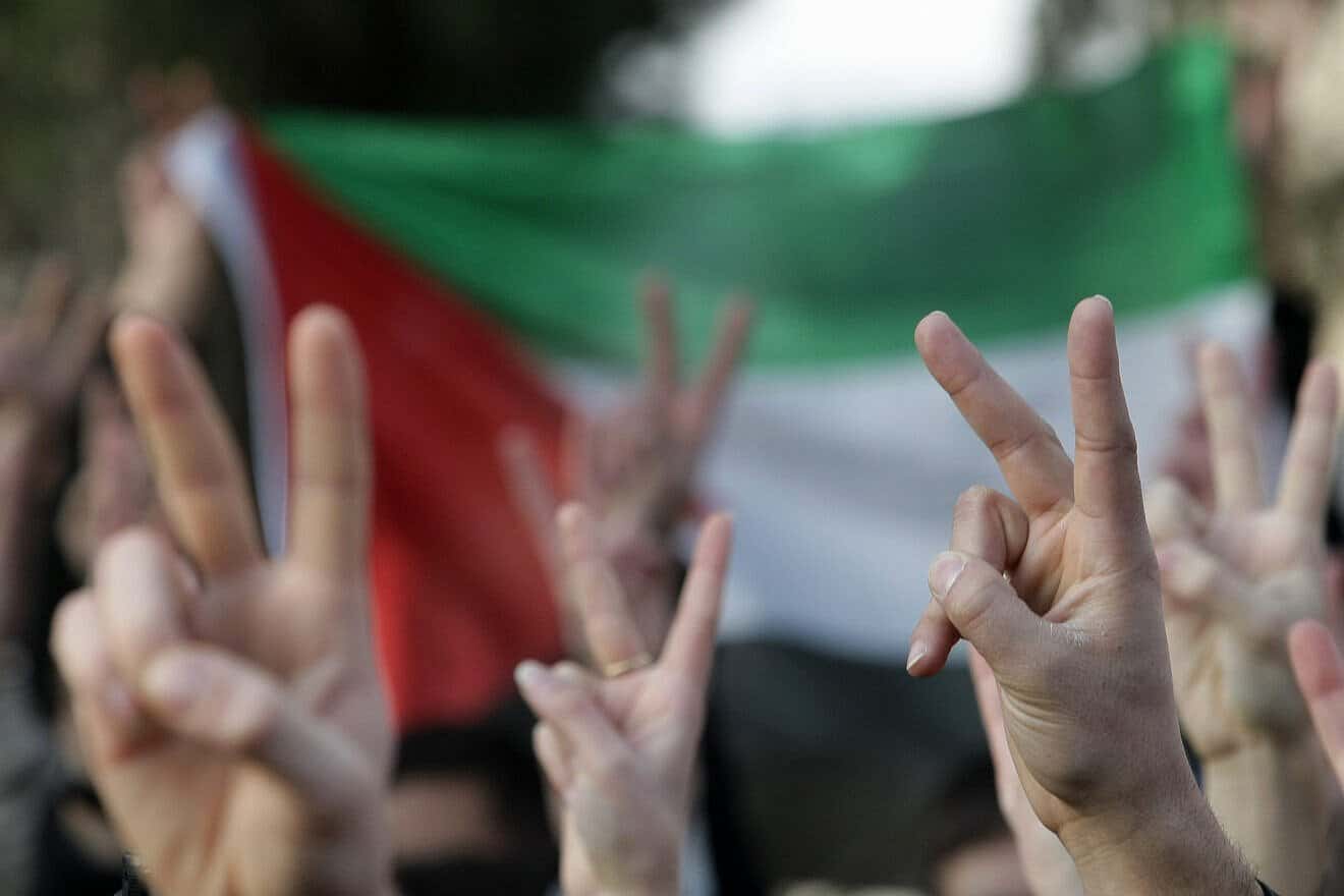 As many as 200 people took part in a demonstration outside of the Hebrew University in Jerusalem, protesting the Israeli military operation in the Gaza Strip and holding signs reading “Free Gaza,” “Free Palestine” and waving Palestinian flags, Dec. 29, 2008. Photo by Kobi Gideon/Flash90.