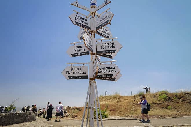 Hundreds of high school students and tourists enjoy a view of Syria from the top of Mount Bental, which was closed to the public due to Israel's war with Hezbollah, which ended with a February ceasefire still in place, May 28, 2025. Photo by Michael Giladi/Flash90.