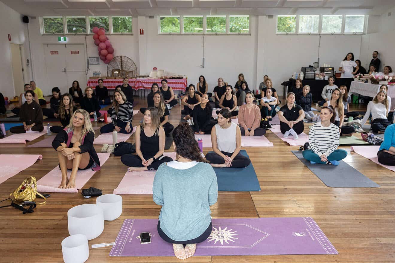 Women attend a yoga event in Sydney, Australia, to honor the memory of Hamas victim Carmel Gat and raise funds for a WIZO-backed shelter and empowerment center for women in Beersheva, May 16, 2025. Credit: WIZO.