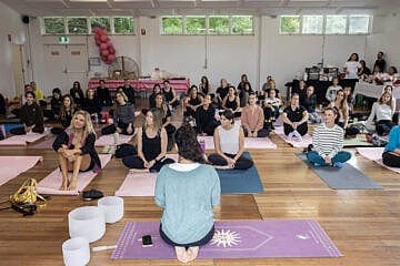 Women attend a yoga event in Sydney, Australia, to honor the memory of Hamas victim Carmel Gat and raise funds for a WIZO-backed shelter and empowerment center for women in Beersheva, May 16, 2025. Credit: WIZO.