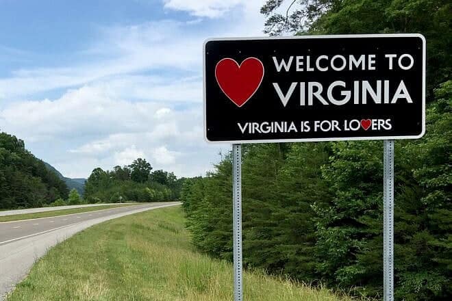 A “Welcome to Virginia” sign along eastbound U.S. Route 58 (Wilderness Road), entering Lee County, Virginia from Claiborne County, Tenn. Credit: Famartin via Wikimedia Commons.