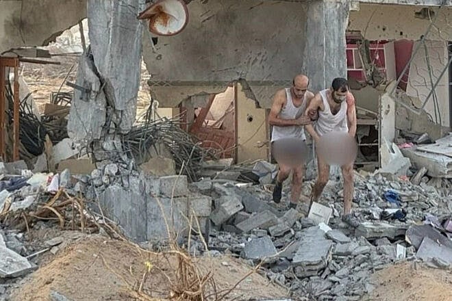 Two Hamas terrorists surrendering to Israeli forces in Rafah during an operation in the Shaboura neighborhood several weeks ago, in an image published on May 6, 2025. Credit: IDF.