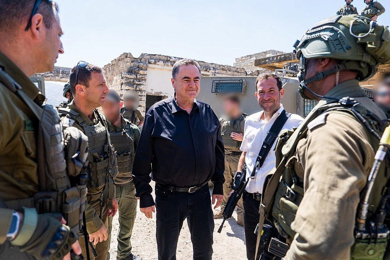 Defense Minister Israel Katz (center) and Samaria Regional Council head Yossi Dagan during a visit to the evacuated Jewish community of Sa-Nur in northern Samaria, May 30, 2025. Photo by Ariel Hermoni/Defense Ministry.