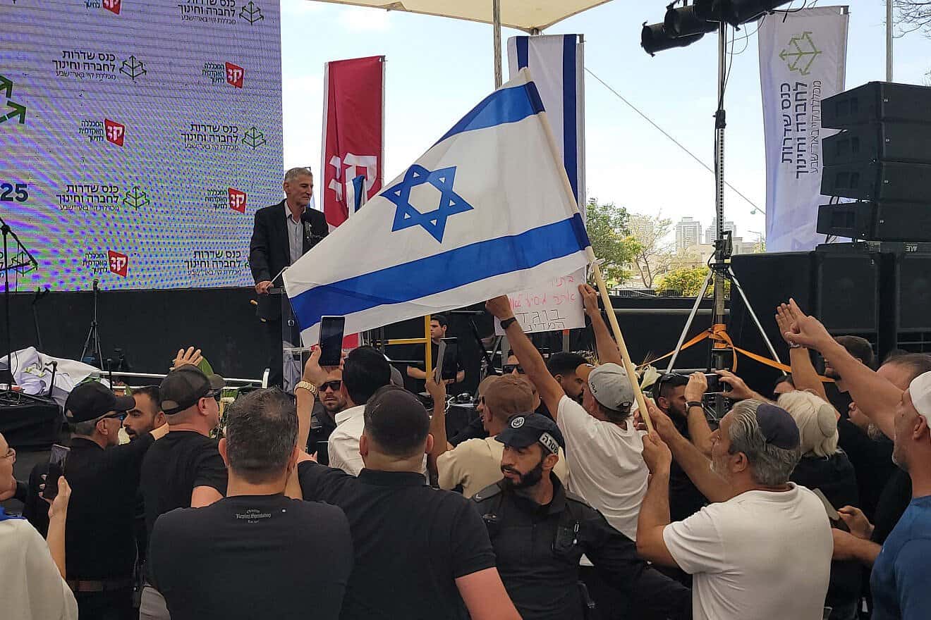 Protesters chant "traitor" as Yair Golan speaks at a conference in Be'er Sheva, Israel on may 27, 025. Photo by Canaan Lidor.