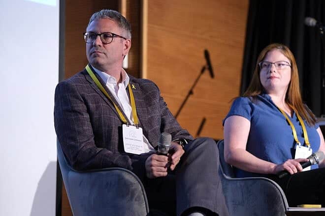 Tel Aviv University's Hay Eytan Cohen Yanarocak and Dina Lisnyansky attend a panel discussion at Kibbutz Lohamei Hagetaot in the Western Galilee on May 21, 2025. Credit: Courtesy of the Alma Center.